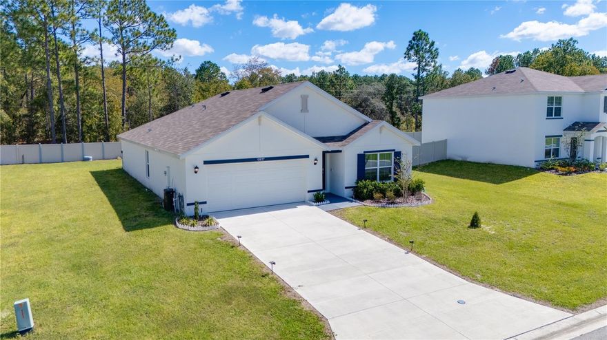 Discover this incredible 4-bedroom, 2-bath home perfectly situated in a high-demand relocation area! Nestled in a peaceful community with a very low HOA, this property offers the ideal balance of comfort, convenience, and lifestyle.Located just minutes from I-75, major avenues, and College Road, you’ll enjoy quick access to everything shopping, dining, schools, healthcare, and more. This stunning home features an extended layout, providing exceptional space to relax, entertain, and make each corner your own. Imagine sipping your morning coffee in your spacious surroundings, enjoying tranquility while still being close to all the action. From comfort to convenience, this home checks every box.