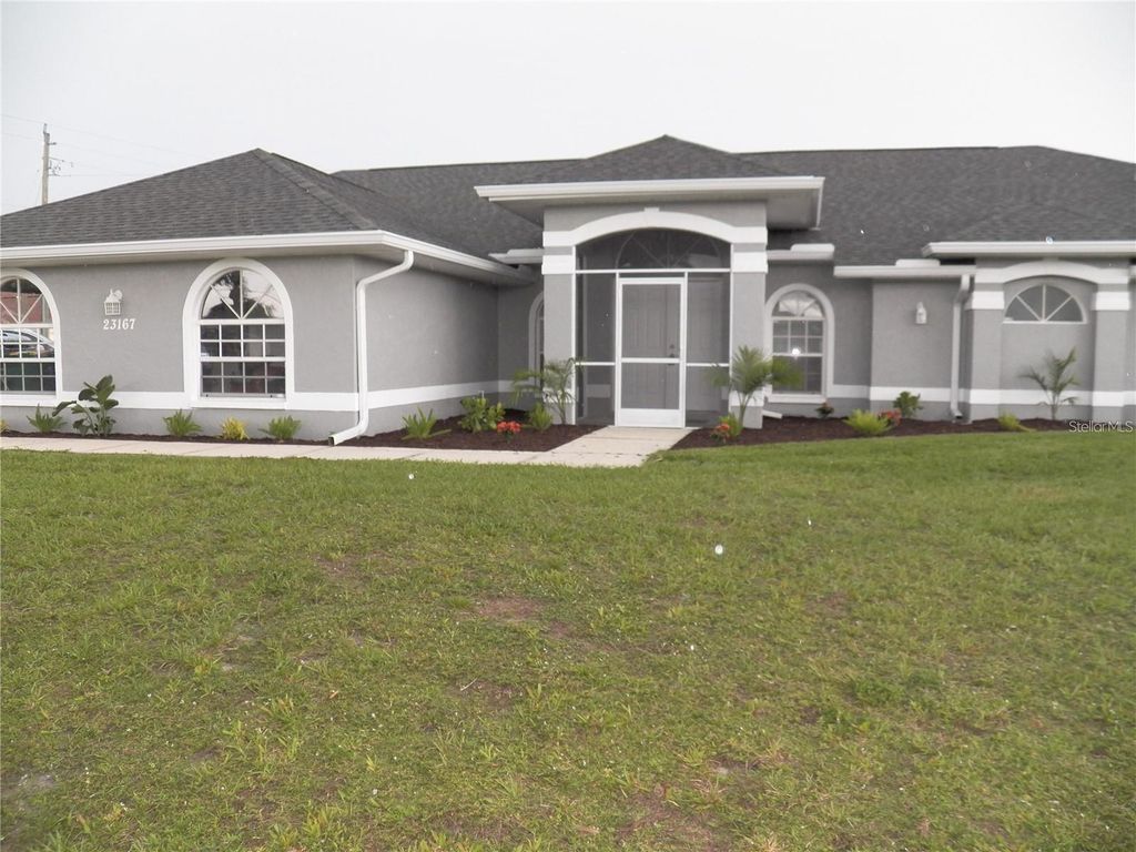 Photo of 23167 Turnbull Avenue, Port Charlotte, FL 33954 (MLS # C7517875)