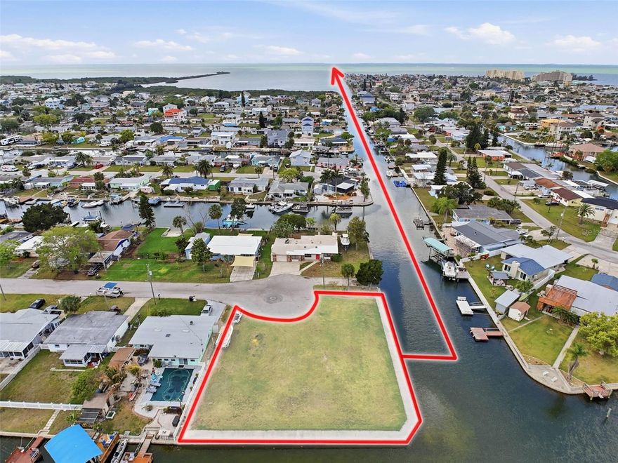 This beautiful cleared 10,680sqft. Double Waterfront Lot is located on the point of 2 deepwater canals with multiple views of the water. Located in the Killarney Shores Subdivision featuring 235ft. of scenic waterfront with a NEW CONCRETE SEAWALL and a 6ft. TOP WALK, (2020). All your local restaurants like Inn on the Gulf, Sam's Beach Bar and Get Hooked are a 5-minute drive. Sunwest Park is a local tourist waterfront attraction that is nearby as well. The Bayonet Point Hospital, many local supermarkets and the Port Hudson Marina are all located right here in Hudson, Florida. The Tampa Bay Airport, Tampa Bay, Clearwater Beach, Homosassa Springs, Tarpon Springs, Pine Island, Honeymoon Island and Weeki Wachee are all under an hour away. Build your DREAM HOME and start enjoying the FLORIDA LIFESTYLE. Fish & crab off your own dock or take a kayak, jet ski or boat ride (passing Manatees and Dolphins along the way) to the GULF OF AMERICA where the fish are plentiful, the fun is never-ending and the sunsets are always awesome!