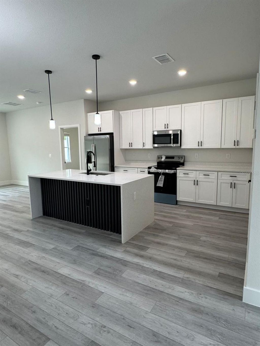 Photo of 13385 SW 32nd Ct, Ocala, FL 34473 (MLS # O6351714)