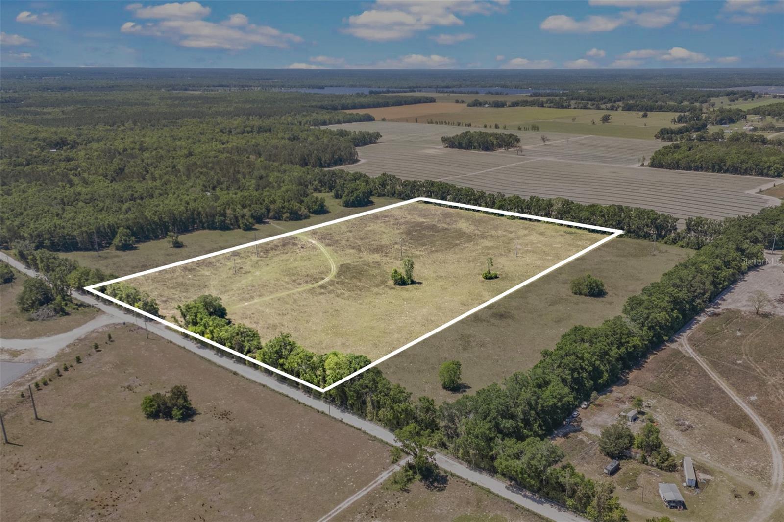 Owner financing available - 30% down.- Welcome to the heart of North Florida! This stunning 20-acre property offers the perfect canvas for your homestead. This 20 acre piece is two 10 acre lots combined and can be sold separately. Completely cleared and maintained, this expansive parcel of land is primed and ready for your plans. This property is a haven for livestock with ample pasture space for grazing. Bring your horses and other animals to roam and enjoy the abundance of greenery that surrounds you. Situated conveniently close to the rivers and springs of Ft. White, outdoor enthusiasts will delight in the endless opportunities for recreation and exploration. From kayaking along scenic waterways to hiking through lush forests, there's never a dull moment in this idyllic locale. With easy access to Gainesville and Lake City, you'll enjoy the perfect balance of rural tranquility and urban convenience. Whether you're commuting for work or simply indulging in a day of shopping and dining, everything you need is within reach. Don't miss your chance to own this exceptional piece of North Florida's landscape. Come and experience the endless possibilities that await you on this beautiful 20-acre property. Additional lots available a total of 20 acres available and can be sold as 10 or 20 acres. Power lines on property. Survey Available