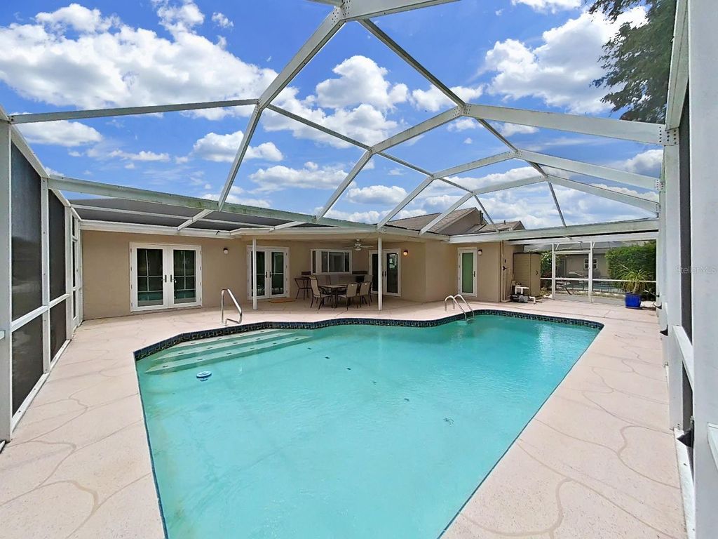 Photo of 9133 Tournament Drive, Hudson, FL 34667 (MLS # TB8507100)