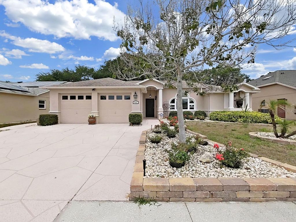 Photo of 9133 Tournament Drive, Hudson, FL 34667 (MLS # TB8507100)
