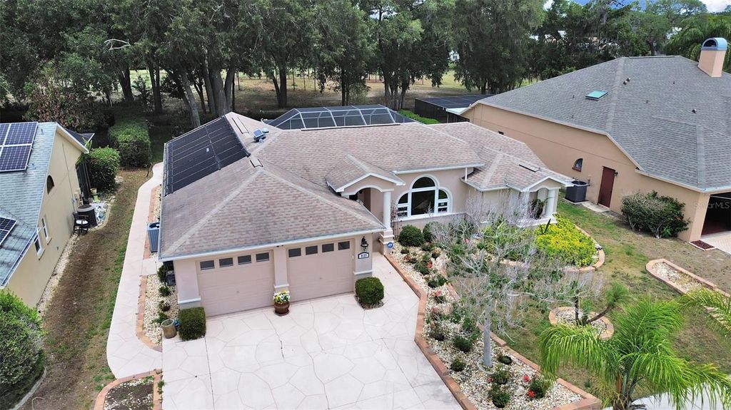 Photo of 9133 Tournament Drive, Hudson, FL 34667 (MLS # TB8507100)