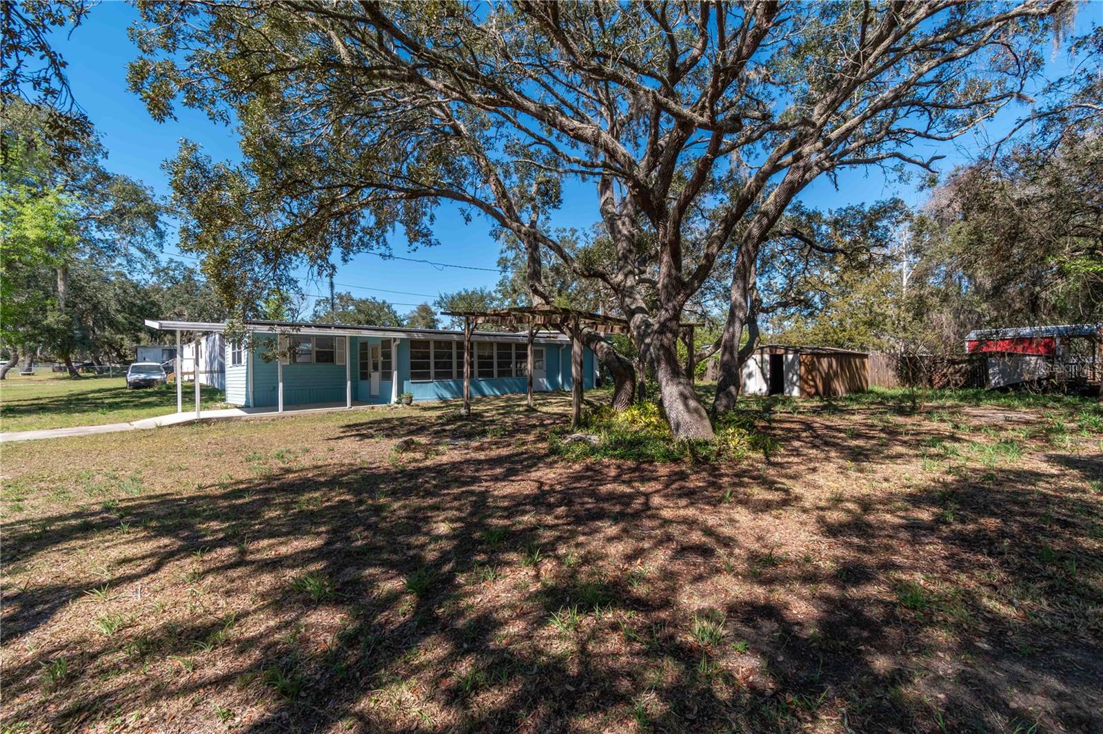 2/1 Singlewide Mobile Home on .34 Acres – Your Florida Getaway Awaits!
Looking for an affordable Florida retreat or full-time home? This charming, remodeled 2-bedroom, 1-bath SW mobile home sits on its own land – no HOA! With recent updates and conventional financing available through a preferred lender, it’s a fantastic opportunity you don’t want to miss.
Recently updated with new electric, repipe to PVC, new flooring, and fresh paint—move-in ready!
Spacious enclosed front porch with a storage/laundry room.
Covered carport for convenient, shaded parking.
Oversized .34-acre lot featuring a stunning granddaddy oak tree, creating a peaceful, park-like setting.
Community water system.
Located on a paved road just off SR 40, offering easy access to Daytona Beach and Florida’s best outdoor adventures, including rivers, trails, and state parks.
Whether you're looking for year-round living or a seasonal escape, this property offers affordability, comfort, and convenience. Or start your own income producing venture with short term rental service for vacationing travelers. Don't wait—schedule your showing today!