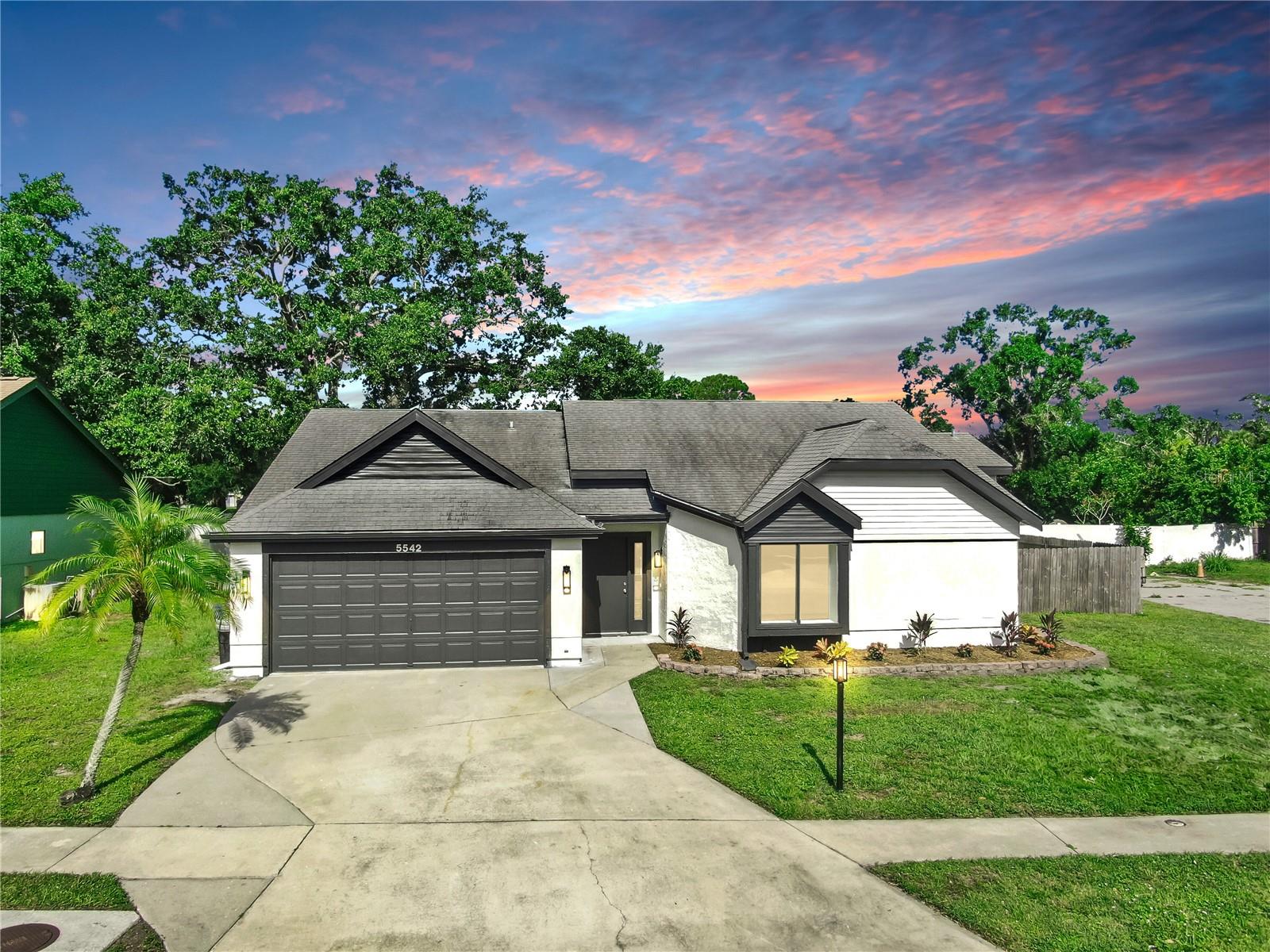 Welcome to 5542 34th Ct E, Bradenton, FL 34203, a beautifully updated pool home on a desirable corner lot! This move-in-ready 3-bedroom, 2-bathroom home offers fresh interior and exterior paint, new flooring throughout, and an open, airy layout with vaulted ceilings and skylights that flood the main living area with natural light. The updated kitchen features modern finishes, ample cabinet space, a huge island, and a seamless flow into the dining and living areas. Both bathrooms have been updated as well, offering comfort and contemporary design.
Step outside to your private oasis: a solar-heated pool surrounded by a fully fenced yard, ideal for relaxing or hosting weekend gatherings. Located on a spacious corner lot in Bradenton, this home offers both privacy and convenience with nearby shopping, dining, and easy access to I-75. Don’t miss the opportunity to own this beautifully renovated home with premium upgrades and Florida charm. Schedule your private showing today!