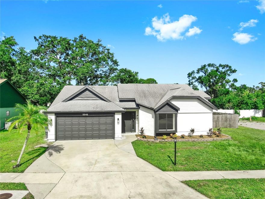 One or more photo(s) has been virtually staged. Seller willing to REPLACE ROOF with reasonable offer!! Welcome to 5542 34th Ct E, Bradenton, FL 34203, a beautifully updated pool home on a desirable corner lot! This move-in-ready 3-bedroom, 2-bathroom home offers fresh interior and exterior paint, new flooring throughout, and an open, airy layout with vaulted ceilings and skylights that flood the main living area with natural light. The updated kitchen features modern finishes, ample cabinet space, a huge island, and a seamless flow into the dining and living areas. Both bathrooms have been updated as well, offering comfort and contemporary design.
Step outside to your private oasis: a solar-heated pool surrounded by a fully fenced yard, ideal for relaxing or hosting weekend gatherings. Located on a spacious corner lot in Bradenton, this home offers both privacy and convenience with nearby shopping, dining, and easy access to I-75. Don’t miss the opportunity to own this beautifully renovated home with premium upgrades and Florida charm. Schedule your private showing today!
