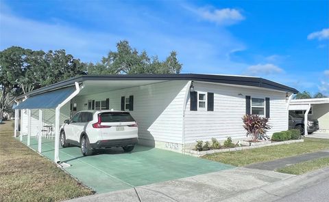 Photo of 1100 Belcher Road S #558, Largo, FL 33771 (MLS # TB8453140)