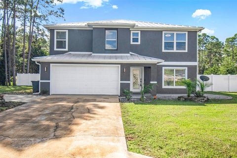 Photo of 61 Reidsville Drive, Palm Coast, FL 32164 (MLS # FC322068)