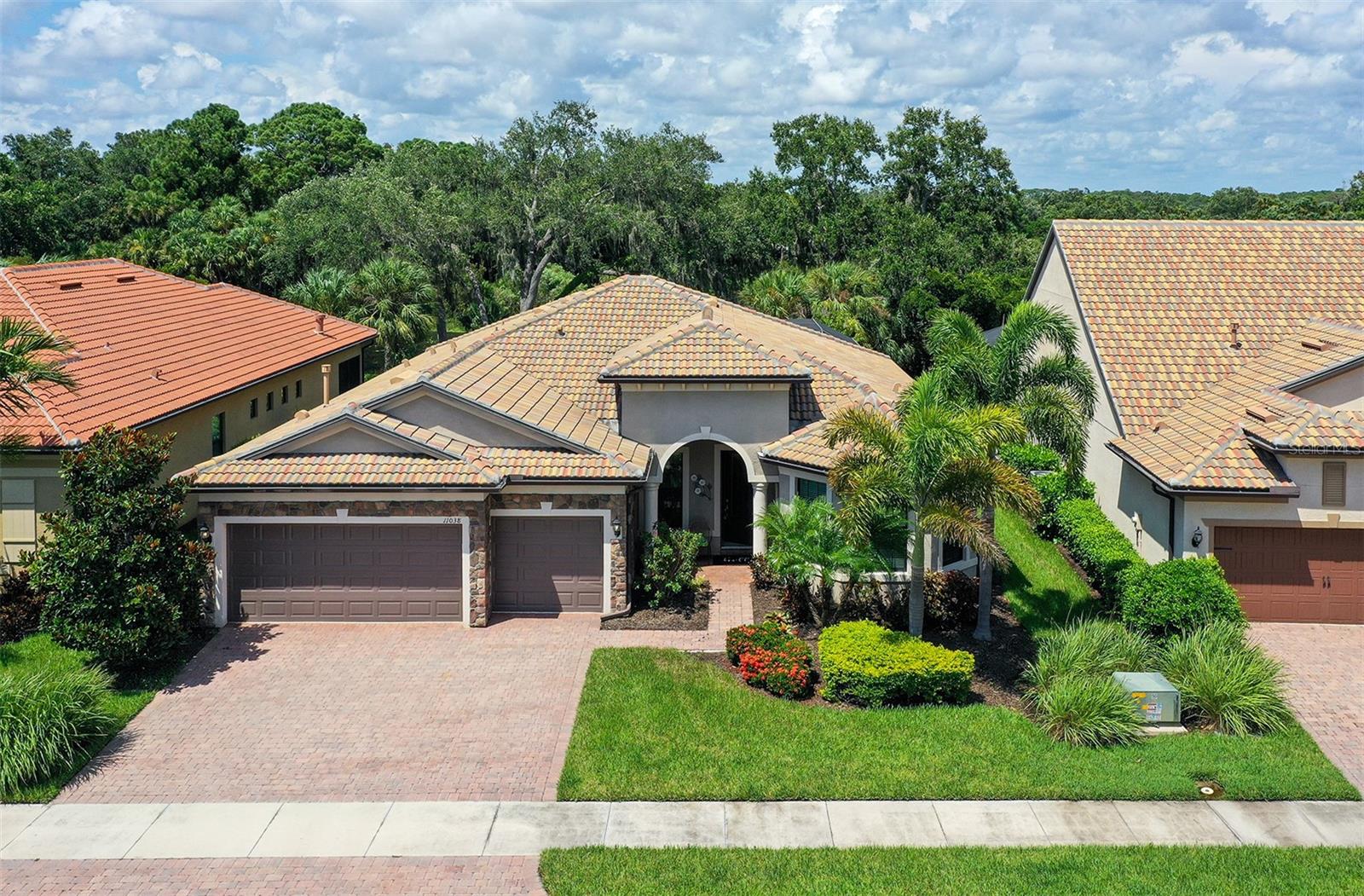 Excellent value in this popular Pinnacle floor plan with heated pool & spa on ultra private water lot backed by private preserve. Very open & spacious great room with 3 generous bedrooms, 3 full baths, den with one guest suite with private bath. Gourmet kitchen features wood cabinets, quartz counters & upgraded stainless appliances. Hurricane impact glass on all windows & doors. Disappearing edge slider opens to a spacious paver brick screened pool area. One of the best lots on Palmer Ranch with total privacy, no houses in the back. This lot overlooks the creek & also has views of protected Eagle preserve. Large neutral tile on the diagonal in the main living area. Master bath has large walk-in shower & very large walk-in closet with organizers. 3 car garage. Natural gas appliances. Located in the heart of Palmer Ranch. Sandhill Preserve is a maintenance free resort style community with a state of the art clubhouse, activity director, fitness, tennis, heated pool/spa pickle ball & more* This is a boutique community of just 303 homes located close to shopping, Legacy Trail & minutes to world famous Siesta Key Beaches*