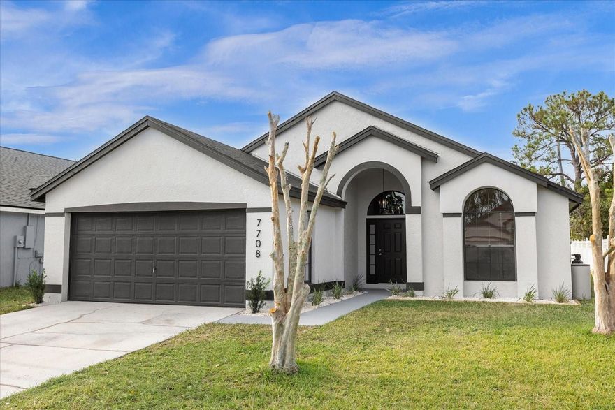 One or more photo(s) has been virtually staged. Fall in love with this freshly updated 3 bedroom, 2 bathroom Orlando home! 

This spacious, open floor plan design is freshly painted inside and out, and features an entirely new kitchen with what has mostly likely the largest quartz countertop breakfast bar you have ever seen! 

With all new stainless steel appliances and kitchen cabinets, designer backsplash and hardware, this is an ideal layout for anyone looking for a bright and airy open floor plan that is perfect for entertaining. Along with offering multiple living, dining and entertaining areas, the primary living area leads into the well sized screened patio for additional space to enjoy. 

This home has all new wood laminate flooring and baseboards throughout the living areas and bedrooms with gorgeous porcelain tile in the kitchen and bathrooms. 

Other updates on this home include a BRAND NEW ROOF, all new plumbing, new water heater, new fixtures throughout, updated bathrooms with new toilets, vanities, fixtures and much more! Do not miss out on this centrally located, freshly renovated Orlando home!