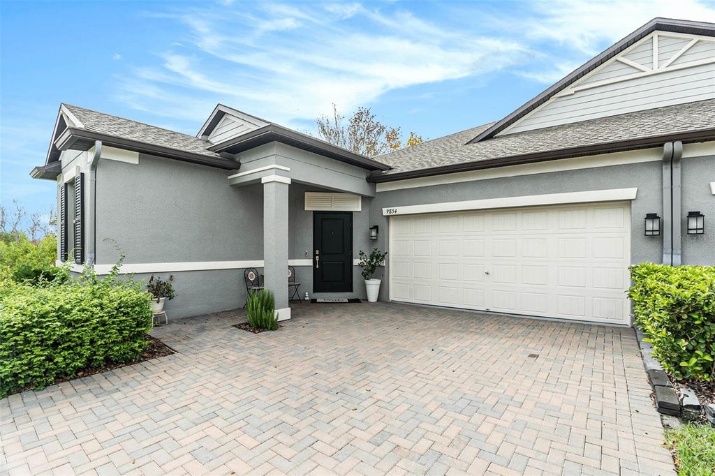 Photo of 9854 Red Bay Loop, Land O Lakes, FL 34637 (MLS # TB8554300)