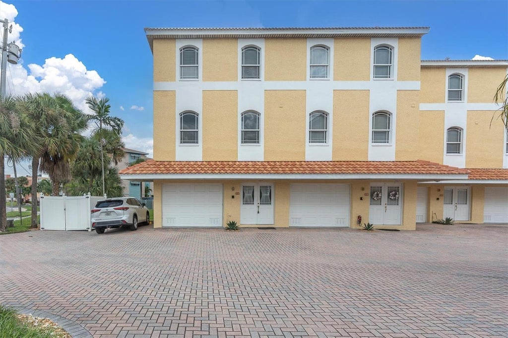 Photo of 11595 Gulf Boulevard #1, Treasure Island, FL 33706 (MLS # TB8549565)