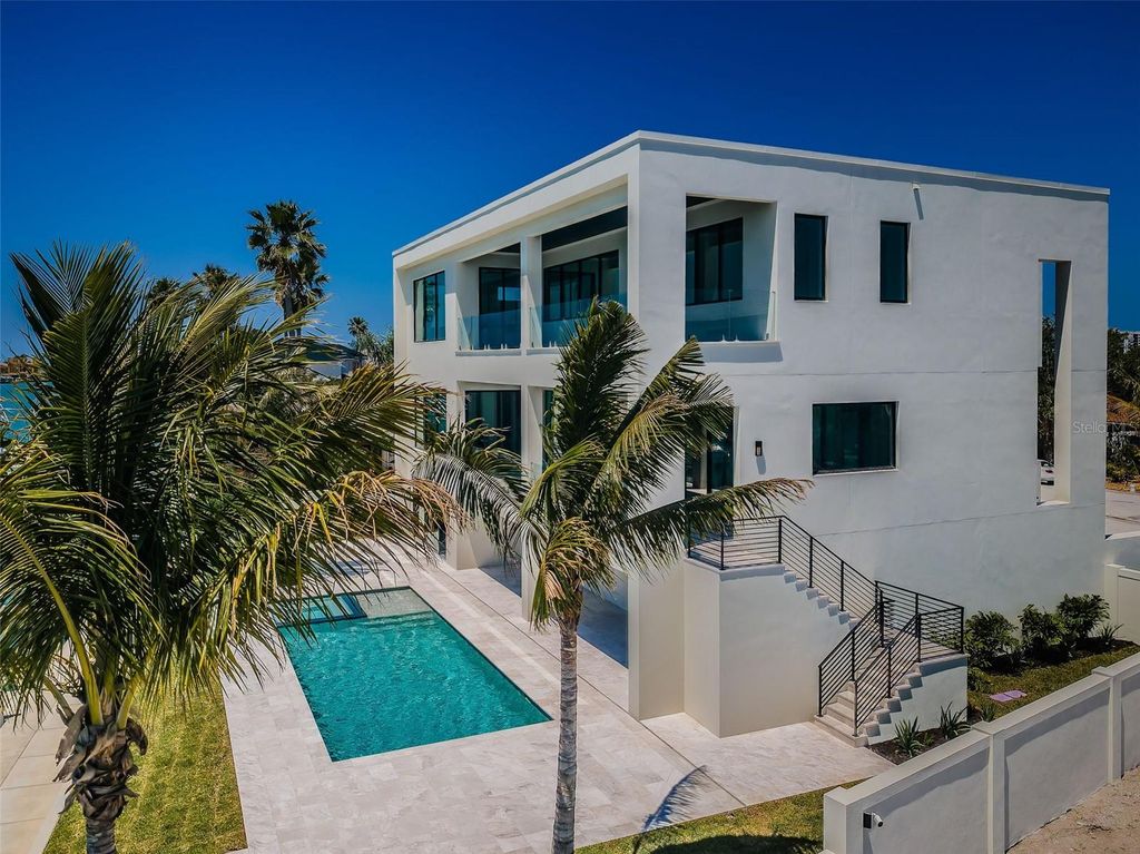 Photo of 236 Howard Drive, Belleair Beach, FL 33786 (MLS # TB8498906)