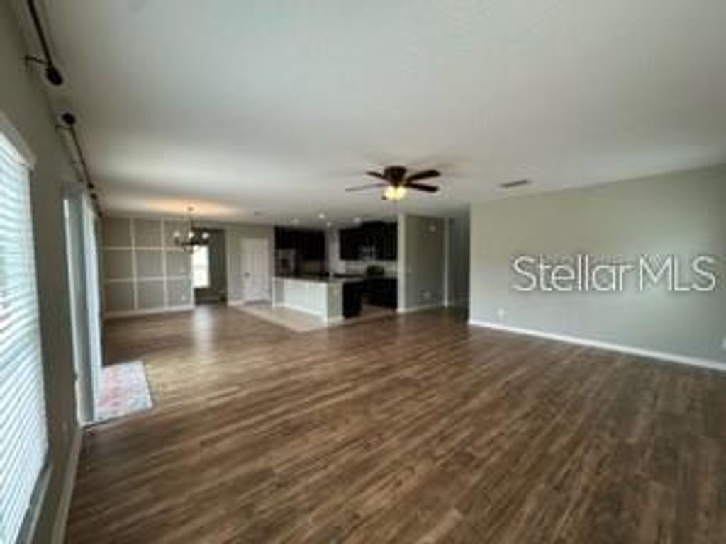 Photo of 1051 Andalusia Loop, Davenport, FL 33837 (MLS # TB8436962)