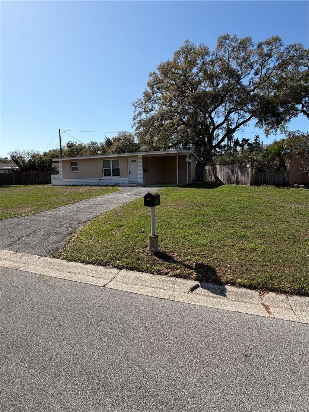 Photo of 972 Cedarwood Avenue, Dunedin, FL 34698 (MLS # TB8487041)