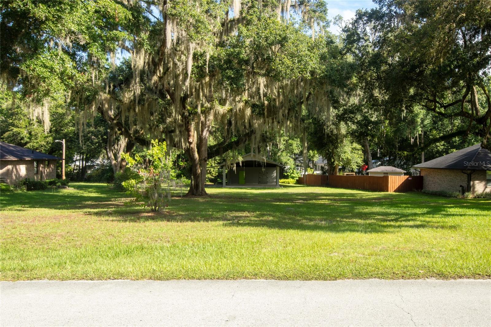 A perfect get away. Bring your RV or rough it. One half acre on Geneva Creek with pole barn. Pole barn measures 24 x 40 and includes a workshop 12 x 24. Shop has toilet, sink, hot water heater and 100 Amp panel box. There is outside shower in the back. Pole barn construction is concrete block with metal roof. Additional lean-to for extra toys. Per prior owner the creek never runs dry and always moving, thus always clear. Bonus NO IMPACT FEE. Septic tank (980 gallons) was permitted. Per Bradford building dept, the septic as it is currently, you can put a 1200 sf house; no bigger than 2 bedrooms. If want to build larger, the drain field would have to be modified. The tank itself can stay in the ground.