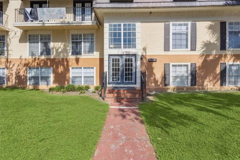 Photo of 3981 Versailles Dr #3981F, Orlando, FL 32808 (MLS # O6357039)