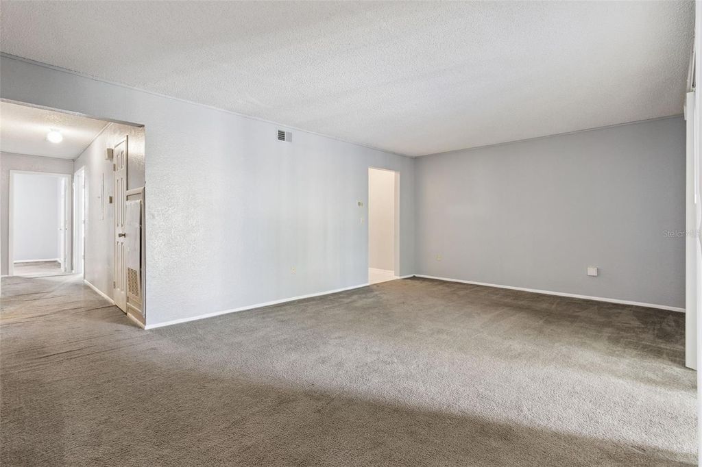 Photo of 3981 Versailles Dr #3981F, Orlando, FL 32808 (MLS # O6357039)