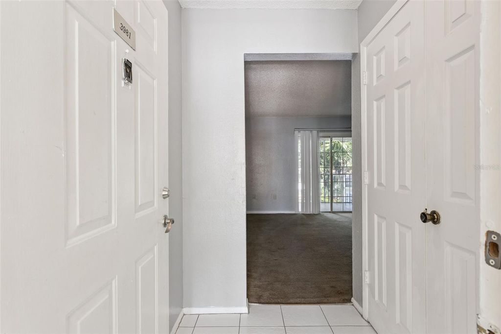 Photo of 3981 Versailles Dr #3981F, Orlando, FL 32808 (MLS # O6357039)