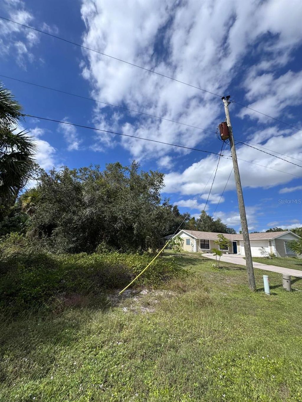 Photo of 13612 Keystone Boulevard, Port Charlotte, FL 33981 (MLS # O6363160)