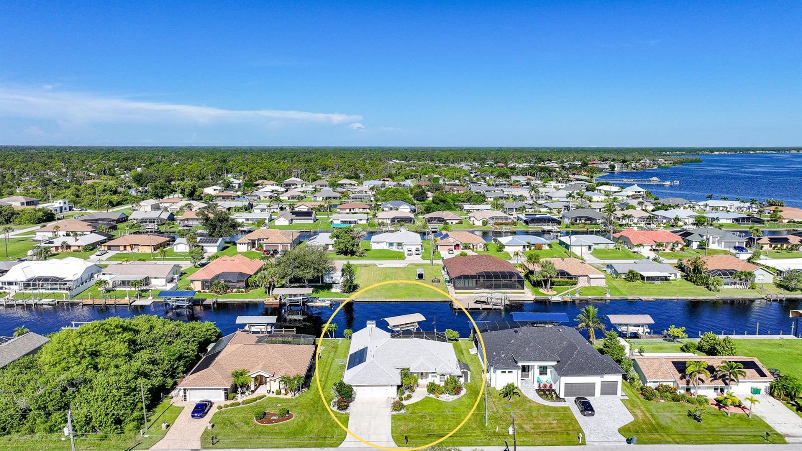 Welcome to 5265 Neville Terrace — a waterfront haven designed for the ultimate Florida lifestyle. With direct, bridge-free access to the Myakka River, Charlotte Harbor, and the Gulf of Mexico, this home offers quick open-water adventures for boating, fishing, jet skiing, and kayaking, right from your own backyard.
Every detail of this property has been crafted by the owners for pristine comfort and an enjoyable living experience. Inside, the split floor plan provides both privacy and functionality, with vaulted ceilings and pocket sliders that fill the home with natural light and frame breathtaking water views. The spacious master suite is a true retreat, featuring two walk-in closets, a spa-inspired bathroom with dual sinks, a garden soaking tub, and a walk-in shower. For added comfort, a mini-split system has been installed in the master bedroom, ensuring year-round relaxation.
Step outside to enjoy the very best of waterfront living. The heated pool and screened lanai create the perfect spot to unwind while overlooking the water. A 12,000 lb boat lift, dock with water and electric, and quick access to open waters make this a boater’s dream.
Recent upgrades bring peace of mind and efficiency, including a new roof, gutters, and pool cage (2023), impact windows, and a solar electric system to keep energy costs low. The home also features a whole-house water filtration and reverse osmosis system, a 200-amp electric panel, and a storage shed.
Located in an excellent area close to everything — from shopping, dining, and entertainment to beaches and golf — this property combines convenience with the beauty of waterfront living. Whether you’re hosting guests, setting out for a day on the water, or simply soaking in the tranquil views, this home offers it all.
Don’t miss the chance to experience this exceptional waterfront lifestyle — schedule your showing today!