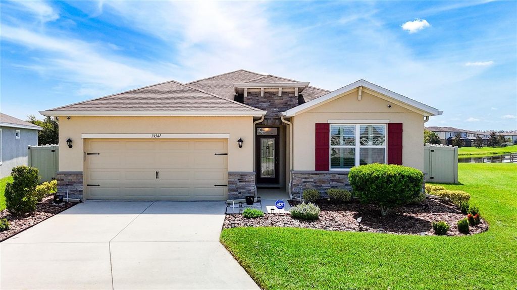 Photo of 31542 Tansy Bend, Wesley Chapel, FL 33545 (MLS # TB8405745)