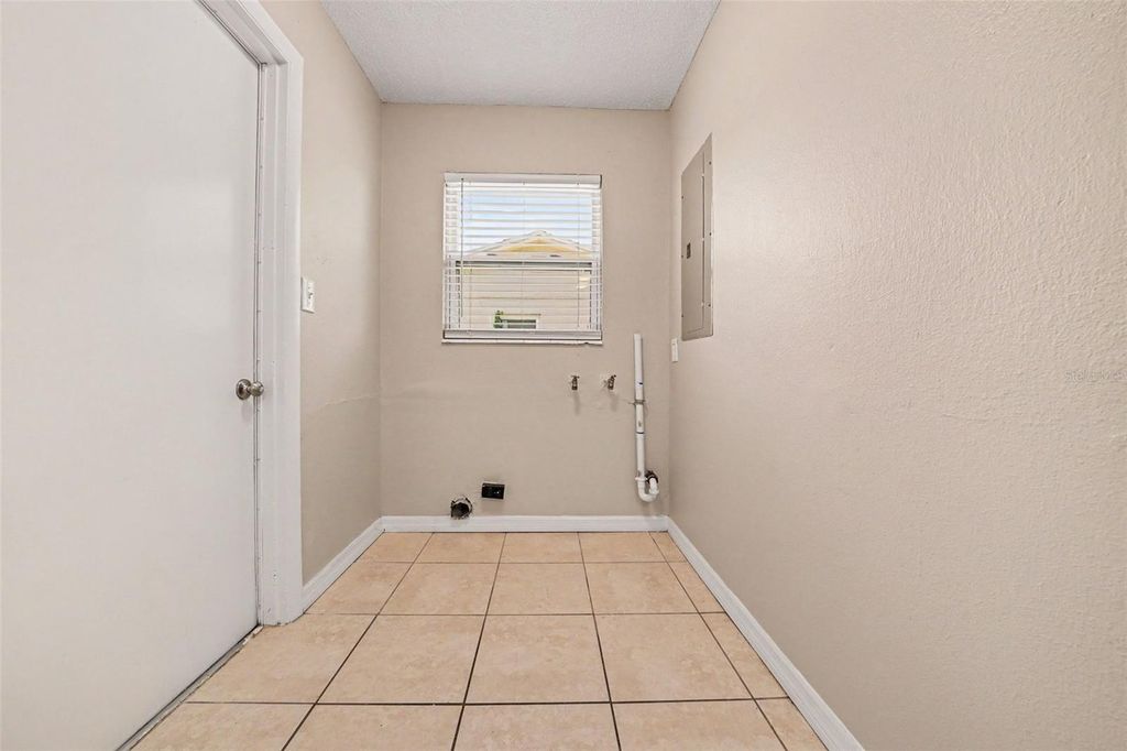 Photo of 1895 S Ivey Lane, Orlando, FL 32811 (MLS # O6427853)