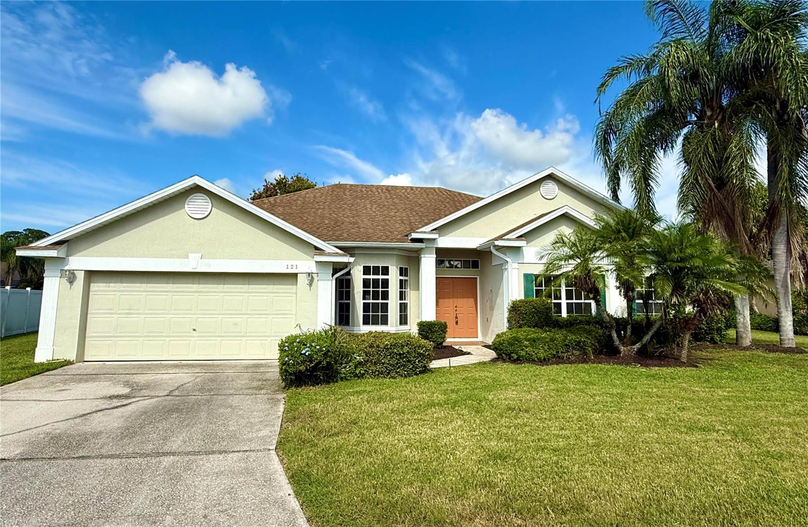 Fantastic Opportunity!! This 4/3 Pool home on an oversized lot is great for entertaining and move-in ready. Freshly painted interior along with all new carpeting in several rooms. Welcome to this light filled, split bedroom open floor plan with extraordinarily high catherdral ceilings. Seperate formal living room and dining room. The kitchen overlooks a huge family room with views out to the spectacular screen enclosed pool. Go out and enjoy your very own backyard retreat with a sparkling private pool surrounded by lush landscaping for the utmost in privacy. The master bedroom features a private sliding door out to the pool, double sink vanity, and two separate walk-in closets. Additionally a Generac brand whole house standby generator system is included. Ridgewood Lakes is a great community. Take advantage of world-class amenities including a public golf course, clubhouse, heated community pool, pickleball courts, and tennis courts. Close to all major theme parks, shopping, dining, and major highways, offering both convenience and access to a range of activities. Call today for more details.