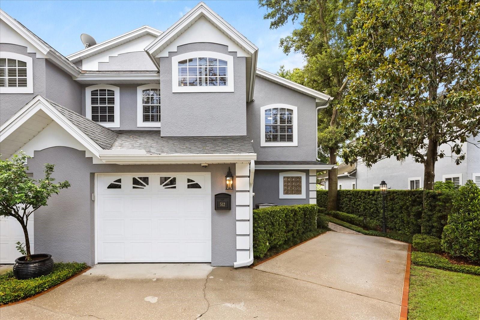 Beautifully updated 4BD/3.5BA townhome in highly sought-after Virginia Heights, just steps from Park Ave, Rollins College and zoned for Audubon K-8! This spacious 2,826 SF home features two primary suites—one on each level—ideal for guests or multi-gen living. Gorgeous hardwood like tile floors throughout, high ceilings, crown molding, and two fireplaces add timeless elegance. The chef’s kitchen includes cherry cabinetry, solid-surface counters, stainless steel appliances, and gas range. Upstairs bonus room is perfect for office or den. There are so many recent updates included, but not limited to: roof (2022), water heater (2023), and HVAC (2021) Enjoy the outdoors from the covered deck, or private balcony. Low-maintenance yard with irrigation 1-car garage, upstairs laundry, and and optional HOA that includes access to private Lake Virginia park. Don’t miss this move-in-ready gem in the heart of Winter Park!
