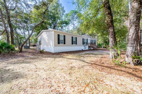 Photo of 11120 NW 107th Terrace, Chiefland, FL 32626 (MLS # GC536452)