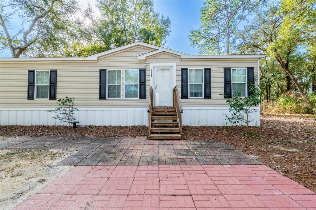 Photo of 11120 NW 107th Terrace, Chiefland, FL 32626 (MLS # GC536452)