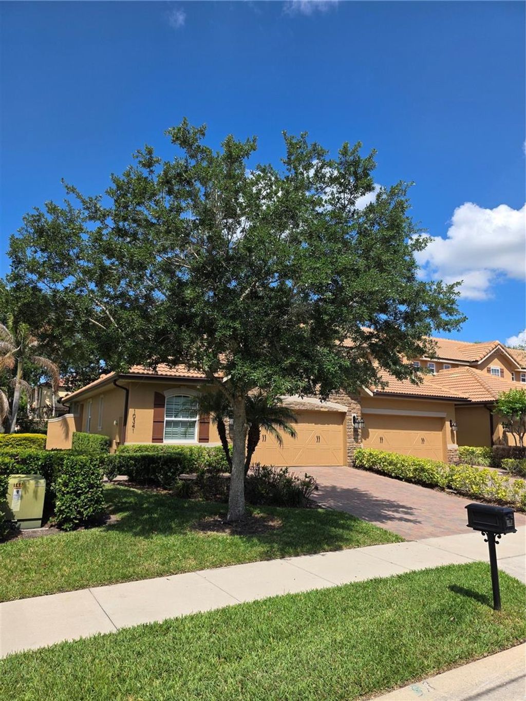 Photo of 10341 Belfry Circle, Orlando, FL 32832 (MLS # O6404577)