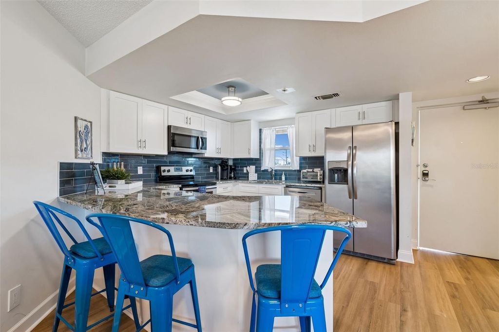 Photo of 4510 Gulf Boulevard #308, St Pete Beach, FL 33706 (MLS # TB8483012)