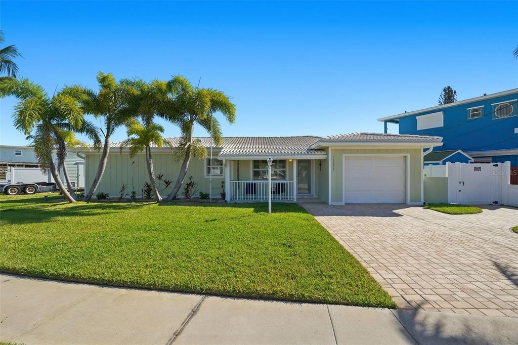 Photo of 15302 Harbor Drive, Madeira Beach, FL 33708 (MLS # TB8433038)