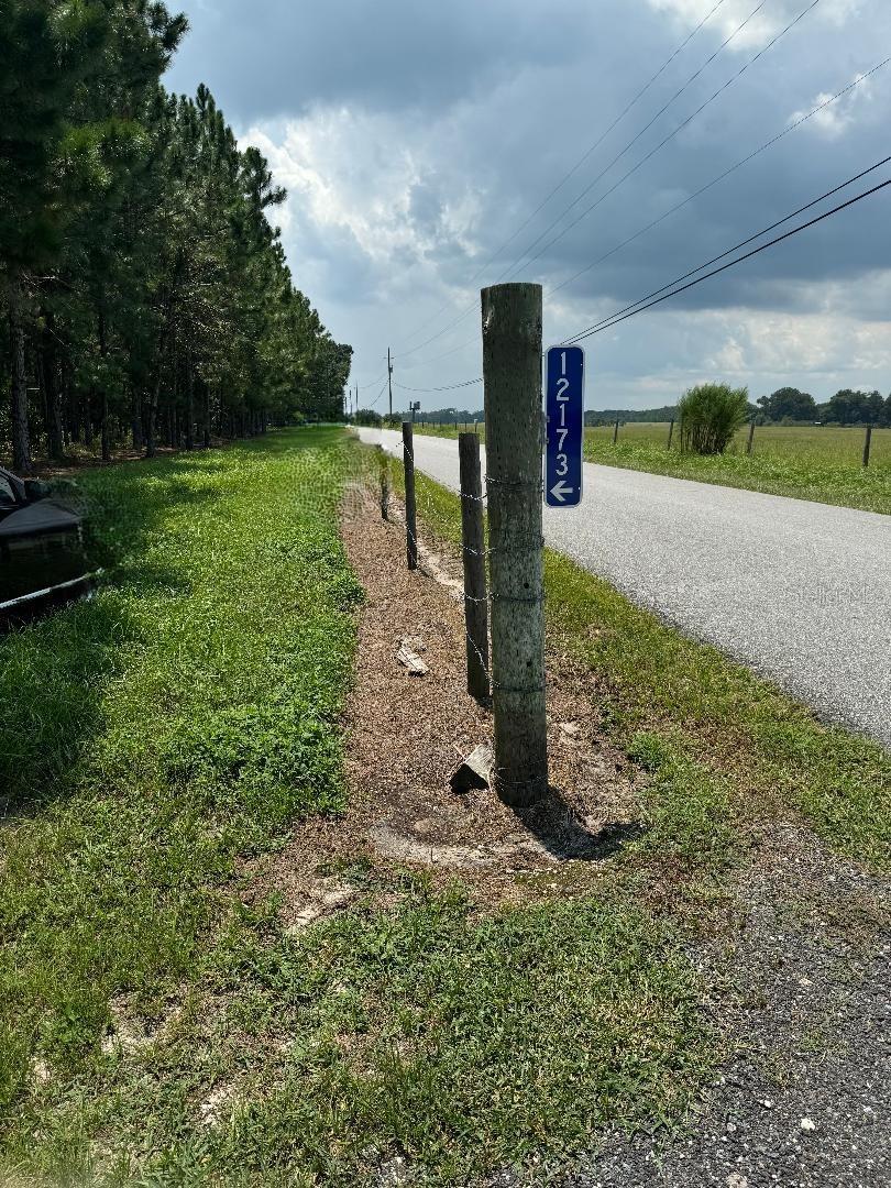 Beautiful piece of land. On Asphalt road but private area of Oxford. The land is wooded with a cleared place in the center of property to build a home. Well and Septic are needed. Land is fenced on 3 sides!