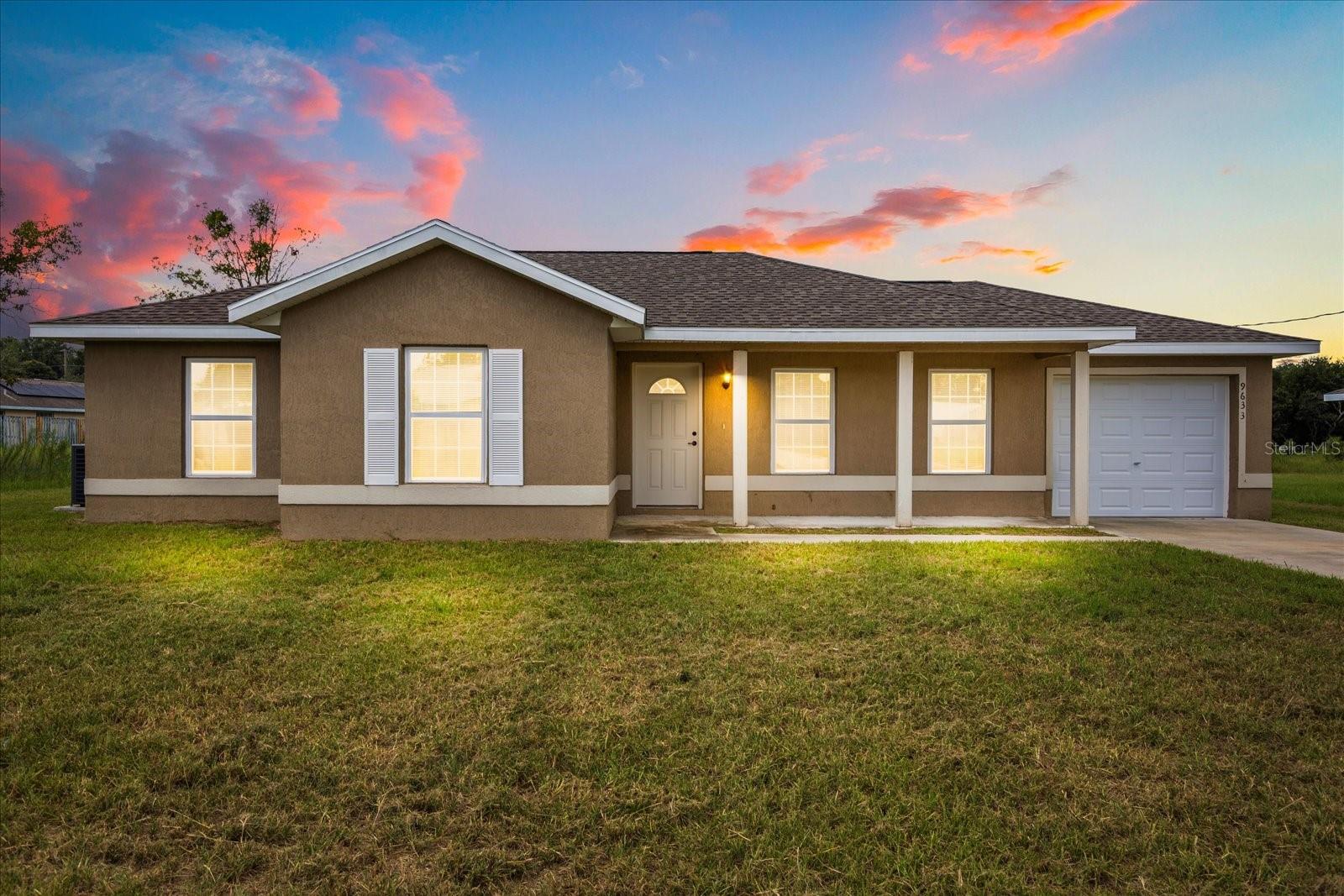 Welcome to 9633 Bahia Road! This recently built 2020 home in the desirable Silver Springs Shores community offers 3 bedrooms, 2 bathrooms, and a spacious backyard. NO HOA! The home features tile flooring in the wet areas and carpet in the living room and bedrooms. Upgrades include granite countertops in the kitchen, an indoor laundry area with washer/dryer hookup, and a 1-car garage. Conveniently located just minutes away from Lake Weir and The Villages, this home offers easy access to major highways like I-75, US-441, 301, and HWY 25. Don’t miss out on this opportunity to make this home yours! Submit your offer today!