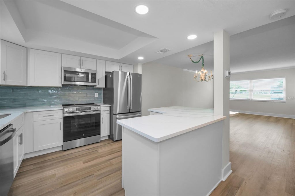 Photo of 4650 Cove Circle #105, St Petersburg, FL 33708 (MLS # TB8518276)