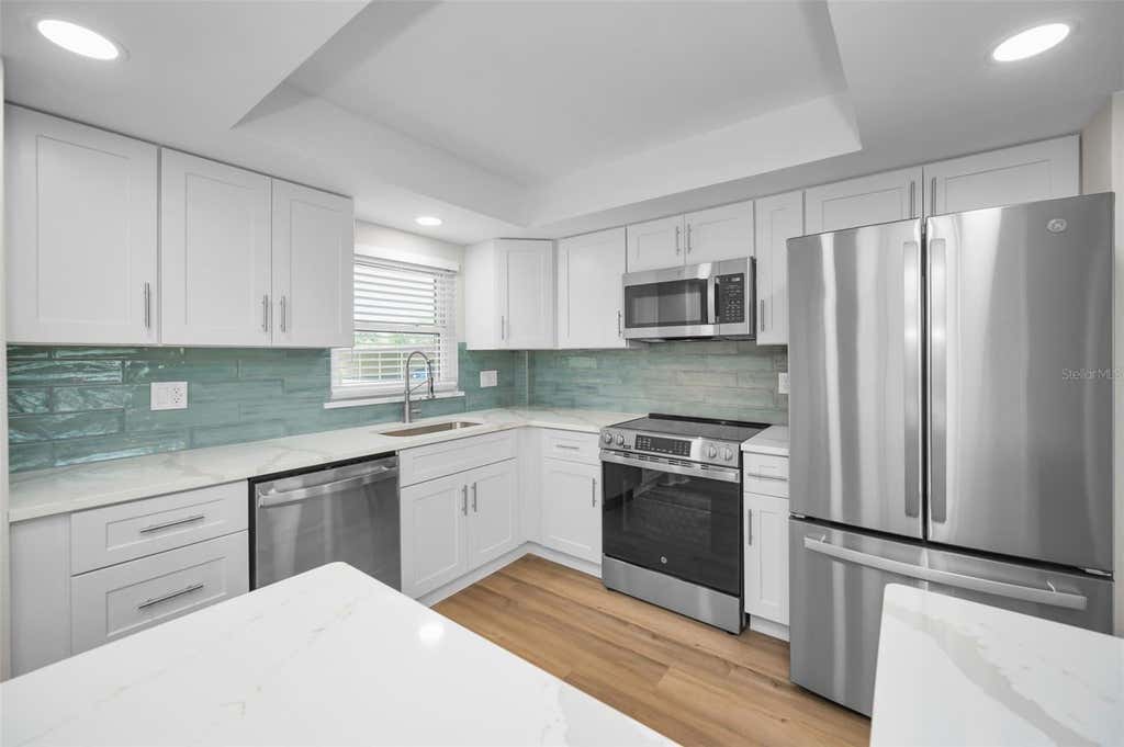 Photo of 4650 Cove Circle #105, St Petersburg, FL 33708 (MLS # TB8518276)