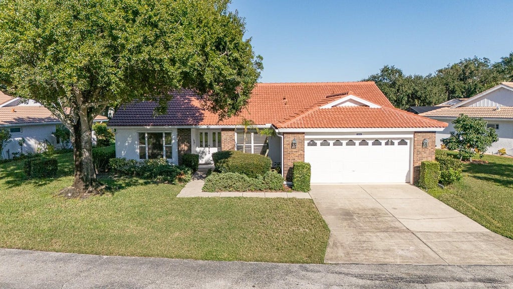 Photo of 5809 Garden Lakes Majestic, Bradenton, FL 34203 (MLS # A4709528)
