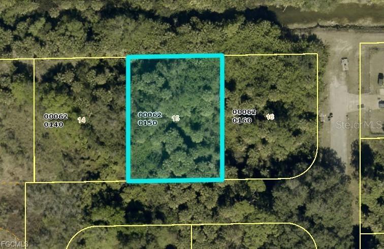 Photo of Pid 10386953, Lehigh Acres, FL 33972 (MLS # TB8556473)