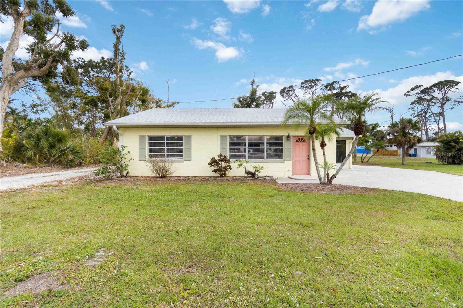 Endless possibilities await with this unique property situated on over HALF AN ACRE in a NO FLOOD zone, bordering an additional lot for sale! This creates a rare opportunity for families or friends looking to live near each other while maintaining their own private space. This property features a main 2-bedroom, 1-bathroom home, along with an additional SEPERATE COTTAGE, offering a 1-bedroom, 1-bathroom dwelling, this is an excellent opportunity for a short- or long-term rental, guest house, or private retreat. A NEW ROOF (2025), along with a NEW A/C and septic system installed in 2024, provide peace of mind. BONUS! The property offers an additional BLOCK SHOP providing extra storage, a workshop, or creative space for the new owners. The expansive lot allows for ample parking, outdoor entertaining, and even room for a boat or RV. Conveniently located just minutes from Nokomis Beach and Venice Beach, this property offers easy access to local restaurants, shops, and outdoor recreation, including the Legacy Trail and Oscar Scherer State Park. Whether you're searching for a primary residence, investment property, or multi-use living space, this home is truly a rare find. Don’t miss this incredible opportunity—schedule your private showing today!