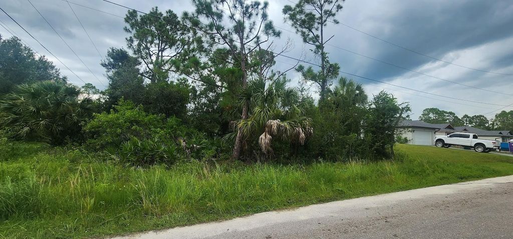 Photo of 22436 Donalda Avenue, Port Charlotte, FL 33954 (MLS # D6143385)