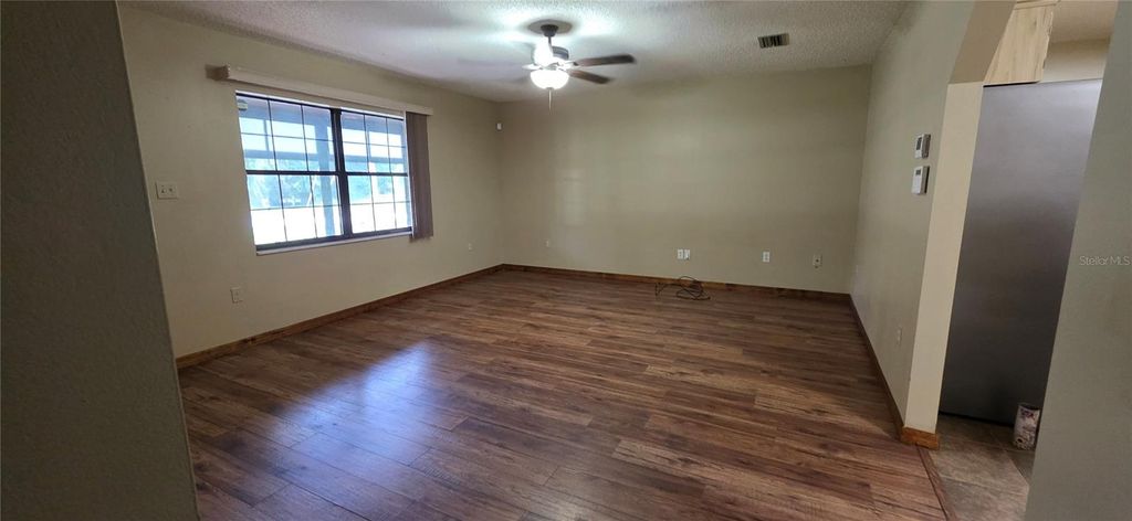 Photo of 40116 Parkinsonia Street, Lady Lake, FL 32159 (MLS # R4910139)