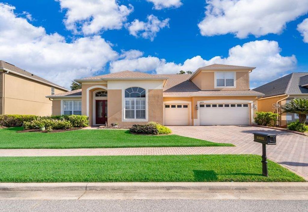 Photo of 10031 Ians Ridge Road, Orlando, FL 32832 (MLS # O6409871)