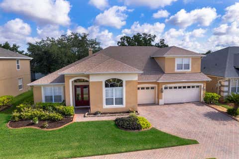 Photo of 10031 Ians Ridge Road, Orlando, FL 32832 (MLS # O6409871)