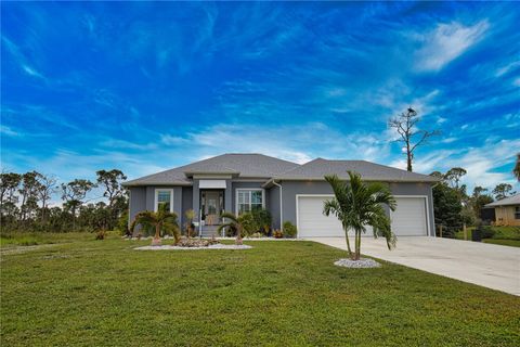 Photo of 1131 Boundary Boulevard, Rotonda West, FL 33947 (MLS # D6144516)