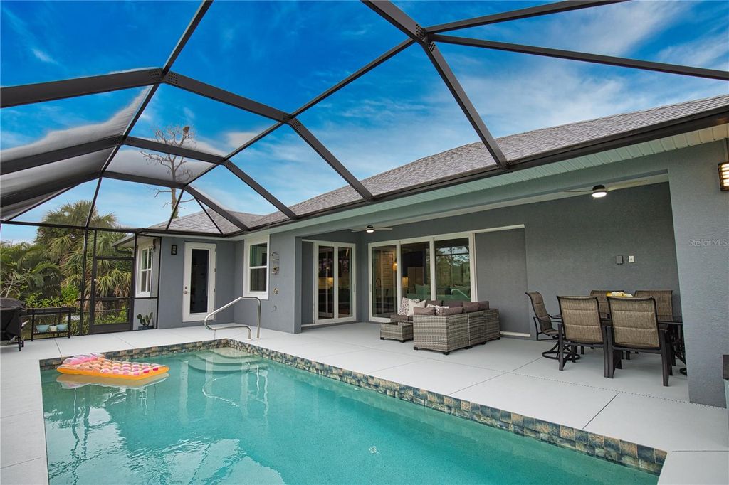 Photo of 1131 Boundary Boulevard, Rotonda West, FL 33947 (MLS # D6144516)