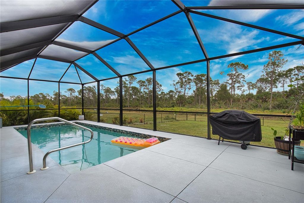 Photo of 1131 Boundary Boulevard, Rotonda West, FL 33947 (MLS # D6144516)