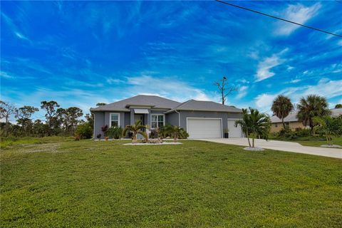 Photo of 1131 Boundary Boulevard, Rotonda West, FL 33947 (MLS # D6144516)